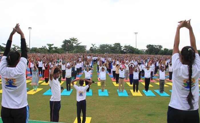 KIIT & KISS staff practise yoga to mark the International Day of Yoga observed in KIIT University.